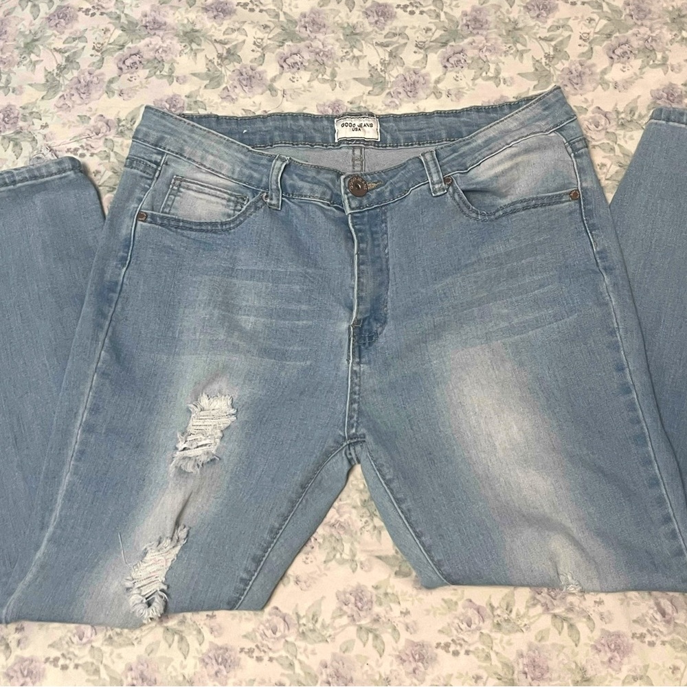 Light blue distressed denim skinny jeans